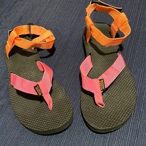Teva Sandals. Size 8. Pink and orange colored. Never worn.